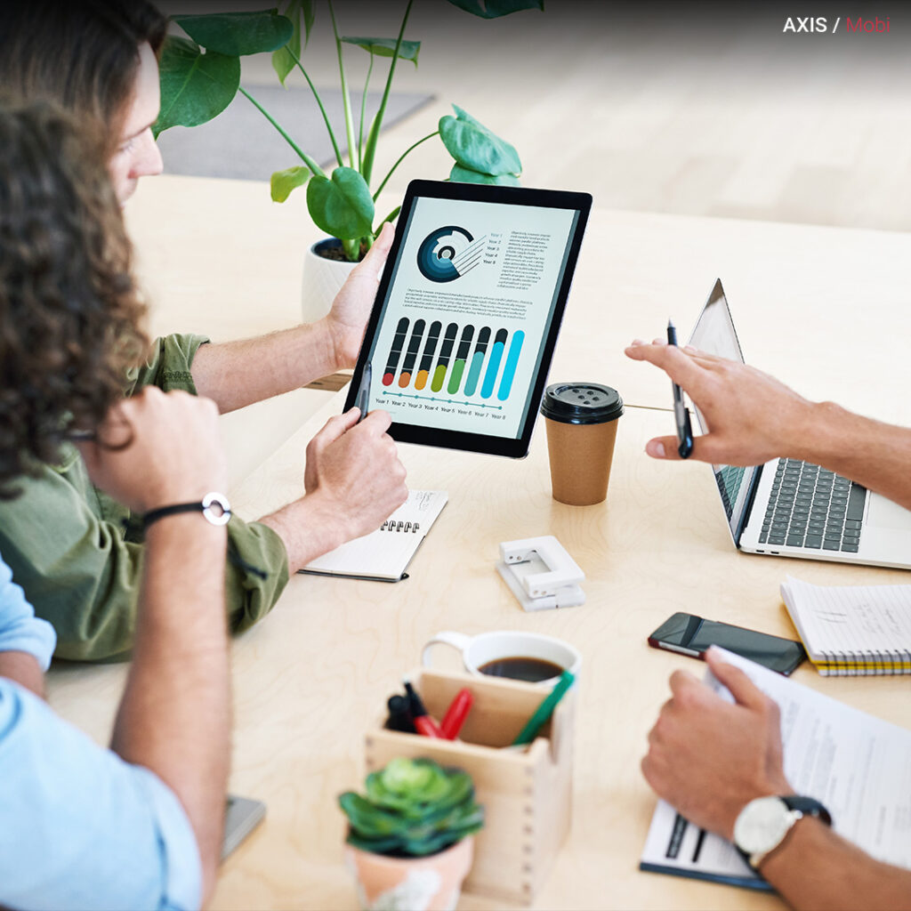 Marketing team brainstorming data privacy strategies around a whiteboard with "Privacy-Conscious Marketing" written on it.