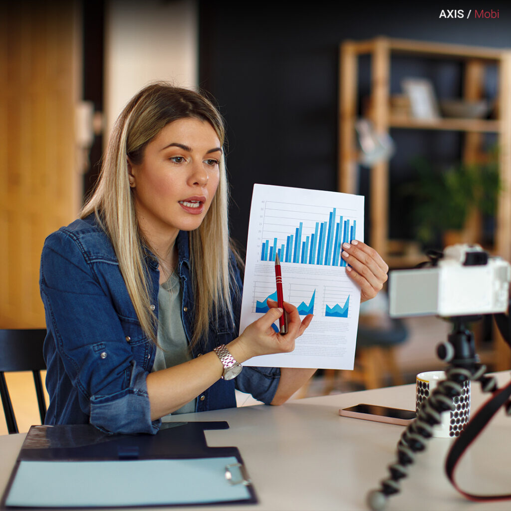 A graph showing an upward trend, an influencer's social media post with high engagement, and marketing analysts reviewing campaign data.